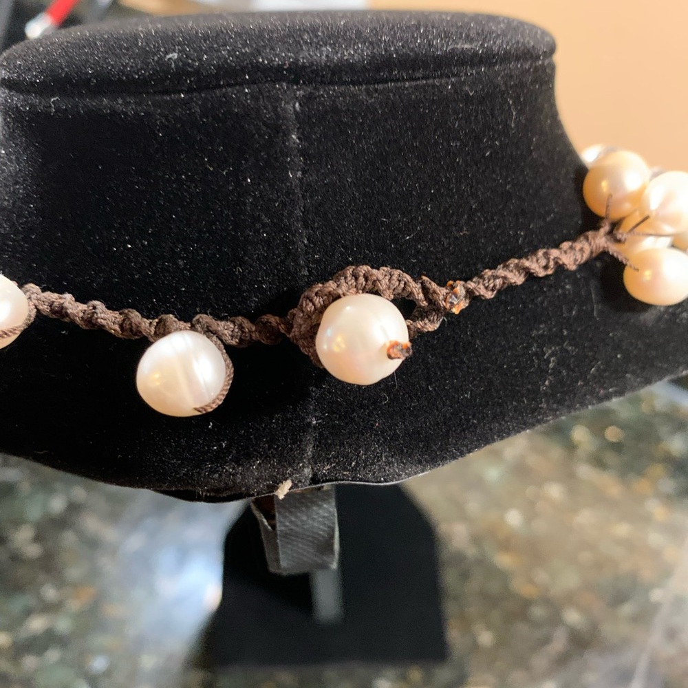 Pearl and Crystal-like beaded 4-strand necklace.